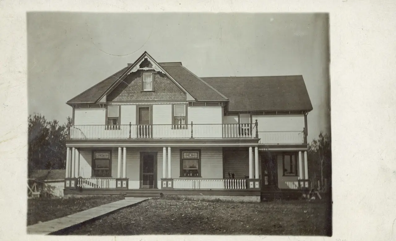 Two-storey house with porch and balcony, about 1910